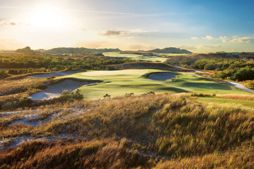 Streamsong golf green and bunkers at golden hour in Central Florida