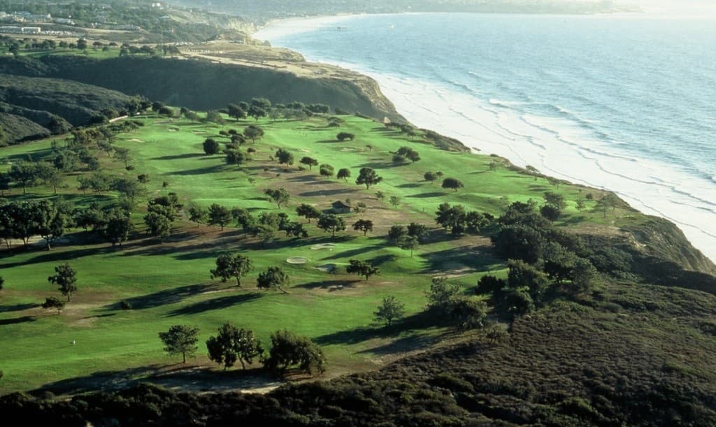 Aerial view of Torrey Pines greens, cart paths, and Pacific shoreline