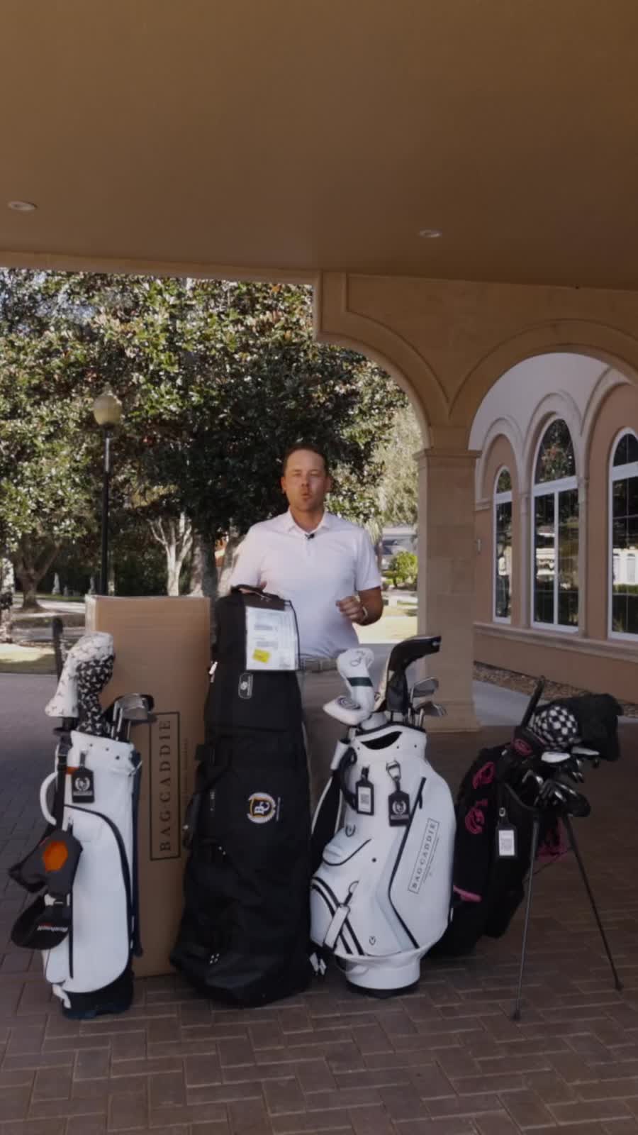 Seven golfers standing together on a golf course for an event or group BagCaddie shipment
